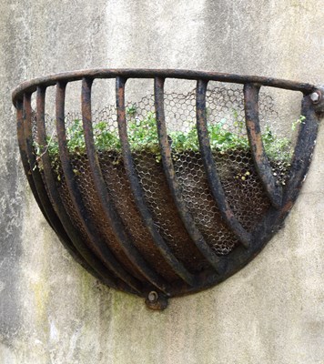 Lot 500 - A 19th century cast iron stable horse feeder...