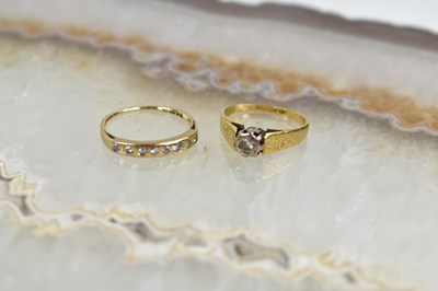 Lot 182 - An 18ct gold and diamond solitaire ring, size...