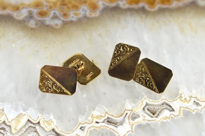 Lot 105 - A pair of 9ct gold cufflinks, engraved with...