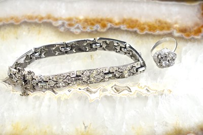 Lot 37 - An Art Deco paste and metal bracelet with...