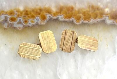 Lot 121 - A pair of 9ct gold cufflinks, with engraved...