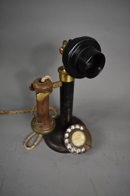Lot 403 - A vintage candlestick telephone with original...