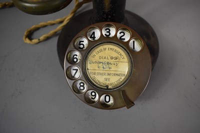 Lot 403 - A vintage candlestick telephone with original...