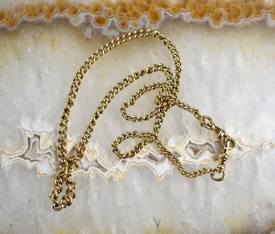 Lot 144 - A gold tested as 9ct Albert chain, 46cm long,...