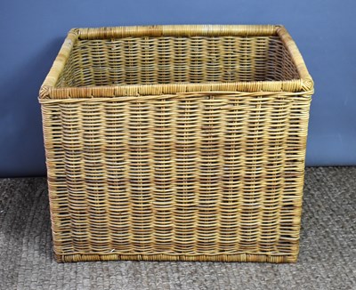 Lot 434 - A modern wicker log basket of large design...