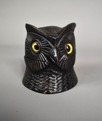 Lot 203 - A carved owls head inkwell with glass eyes...