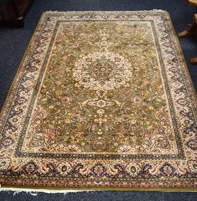 Lot 417 - A 19th century Hamadan rug in a green ground...
