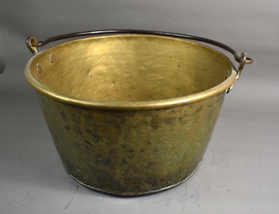 Lot 401 - A large heavy 19th century brass cauldron with...