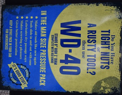 Lot 506 - An enamel reproduction sign for WD40 Trust...