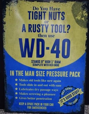 Lot 337 - An enamel reproduction sign for WD40 Trust...