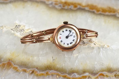 Lot 304 - A 1920s 9ct gold cased ladies wristwatch with...