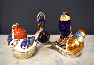 Lot 63 - A group of five Royal Crown Derby paperweights...