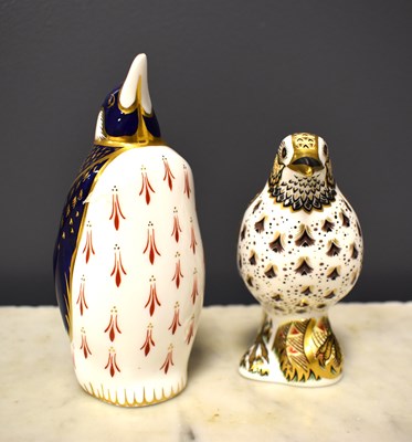 Lot 58 - Two Royal Crown Derby paperweights, one a song...