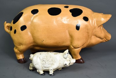 Lot 248 - Two 19th century cast money pig banks in cast...