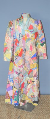 Lot 105a - A vintage patchwork housecoat, in the Art Deco...