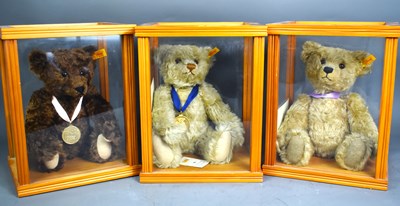 Lot 228 - A collection of three Steiff bears with medal...