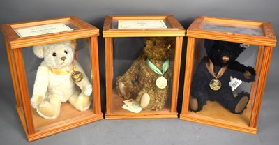 Lot 230 - A collection of three Steiff bears with medal...