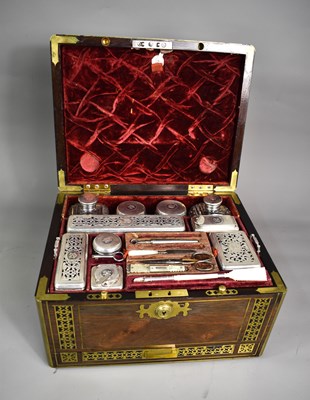 Lot 311 - An early 19th century rosewood wood and brass...