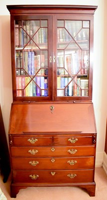 Lot 472 - A George III bureau bookcase, the fall front...