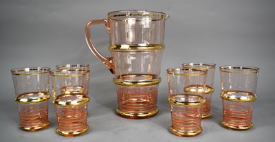 Lot 35 - A 1950’s lemonade set consisting of glass jug...