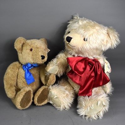 Lot 214 - A large white long haired teddy bear with...