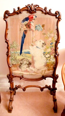 Lot 466 - A 19th century walnut fire screen stand, the...