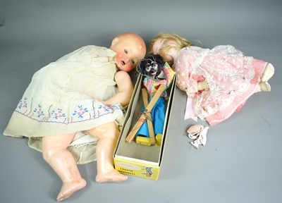 Lot 212 - Two vintage dolls comprising a doll with wig...