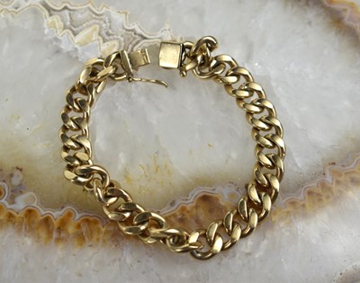 Lot 144 - A 9ct gold curb link bracelet with clasp...