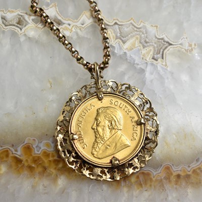 Lot 172 - A 1oz gold Krugerrand dated 1974, in a 9ct...