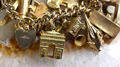 Lot 169 - A fine 9ct gold charm bracelet with 24 charms...