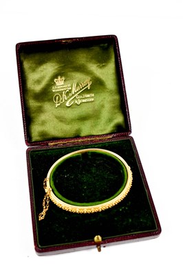 Lot 138 - A Victorian 15ct gold hallmark hinged bangle...