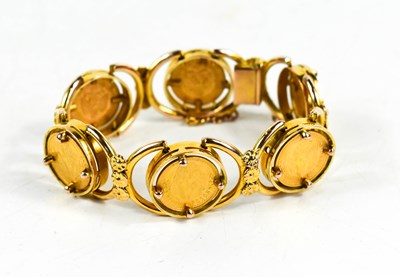 Lot 158 - A gold articulated bracelet with six 1945 Two...