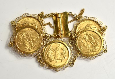 Lot 201 - A sovereign bracelet with five full sovereigns...