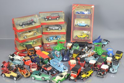 Lot 56 - A group of vintage toy vehicles comprising a...