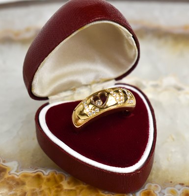 Lot 139 - A diamond ring by Chopard the 18ct band...