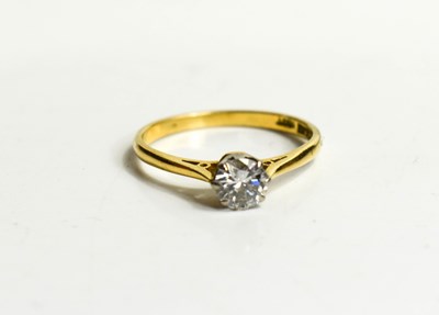 Lot 112 - An 18ct gold solitaire diamond ring, stamped...