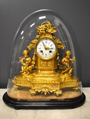Lot 390 - A late 19th century gilt ormulu clock, the...
