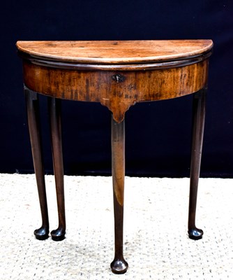 Lot 432 - A 19th century mahogany demi-lune tea table,...
