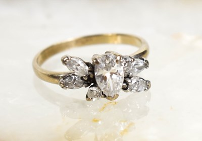 Lot 111 - A white metal and cubic zirconia cluster ring,...