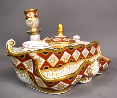 Lot 41 - A 19th century porcelain desk inkstand, with...