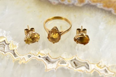 Lot 116 - A 9ct gold and topaz ring, size N, and...