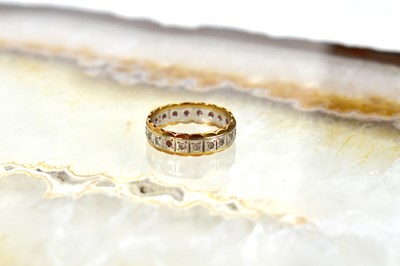 Lot 189 - An 18ct gold and diamond band ring, 4.2g, size...