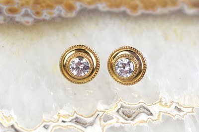 Lot 99 - A pair of 9ct gold and cubic zirconia set...