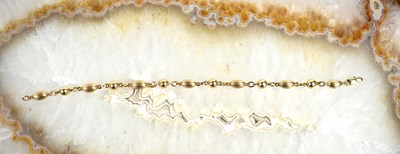 Lot 140 - A 9ct gold modern link bracelet, 18cm long, 6.4g.