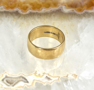 Lot 141 - A 9ct gold wedding band, size N,5.7g.
