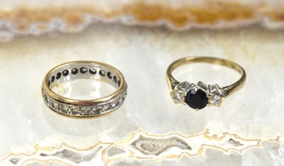 Lot 96 - A 9ct gold and diamond eternity ring, size M,...