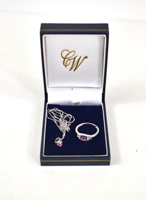 Lot 93 - A 9ct white gold and pink sapphire ring, size...