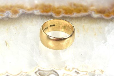Lot 176 - A 9ct gold wedding band, size P/O, 7.2g