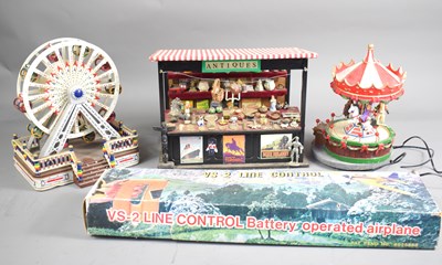 Lot 350 - A vintage diorama of an Antique shop together...