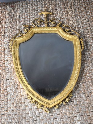 Lot 359a - A 19th century shield shaped wall mirror with...